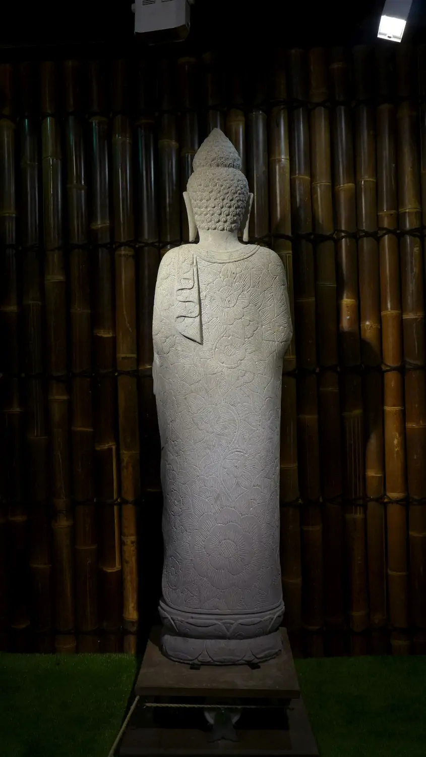  Product image 7 of the product “Standing Buddha with floral carving, Abudaya position. 43 x 39 x 175cm. Natural stone (river stone), stonemasonry ”